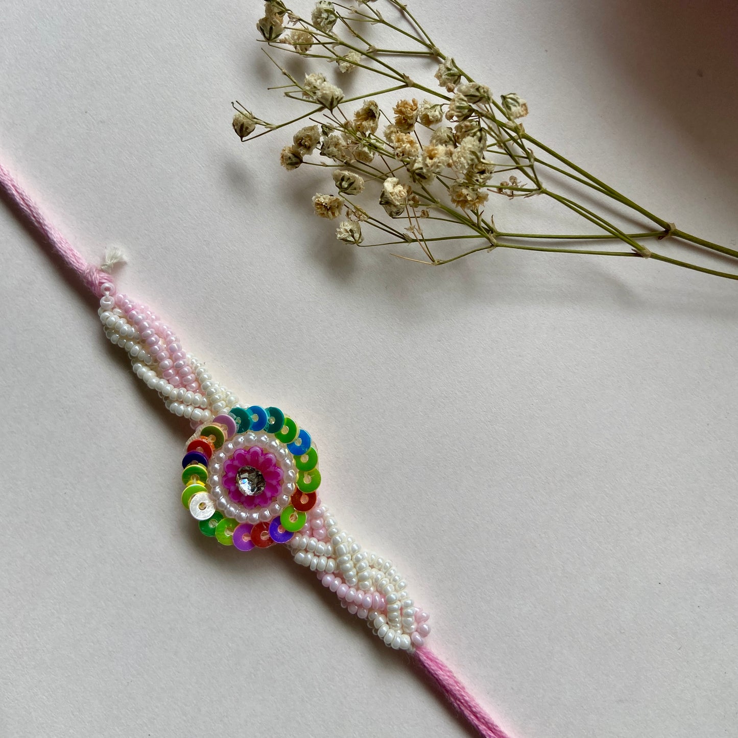 Rainbow White Beads rakhi