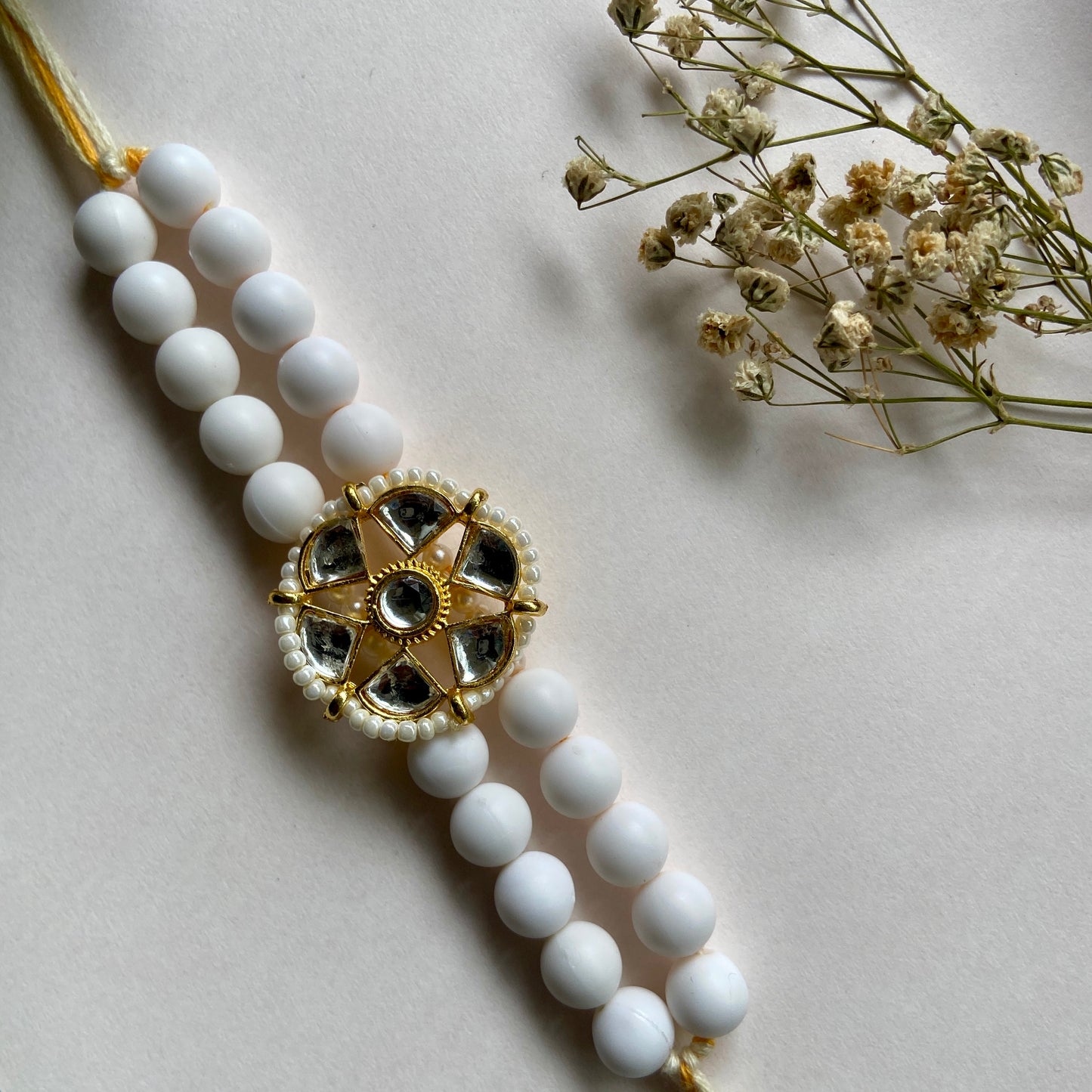 White beads Kundan rakhi