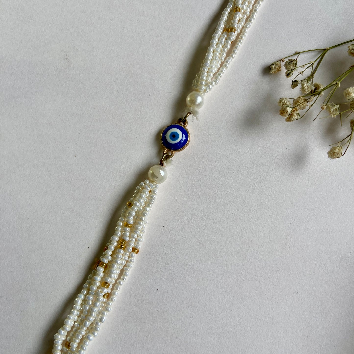Evil Eye white beads Rakhi for Women